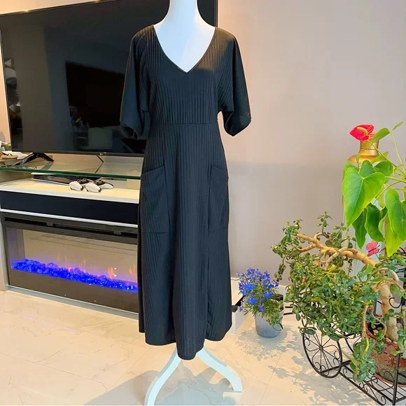 Rolla Coster Plunging Black Wrap Dress with
Flutter Sleeve Size: L - Picture 2 of 16